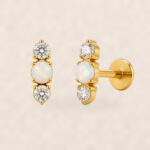 Flat Back Stud Earrings Opal Crystal Trio Bar in F136 Titanium on warm ivory background