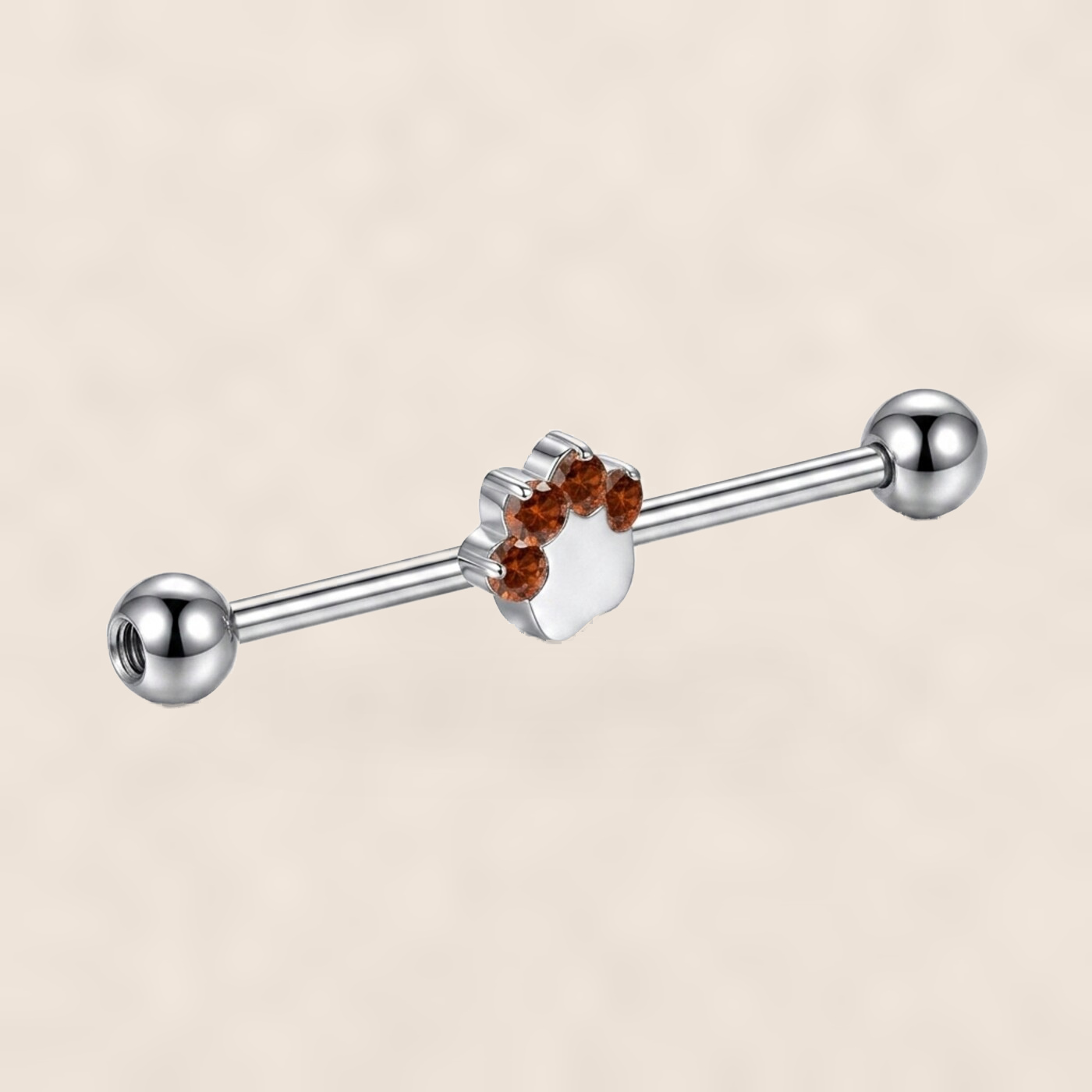 G23 Titanium Cat Paw Crystal Industrial Barbell Earring on warm ivory background