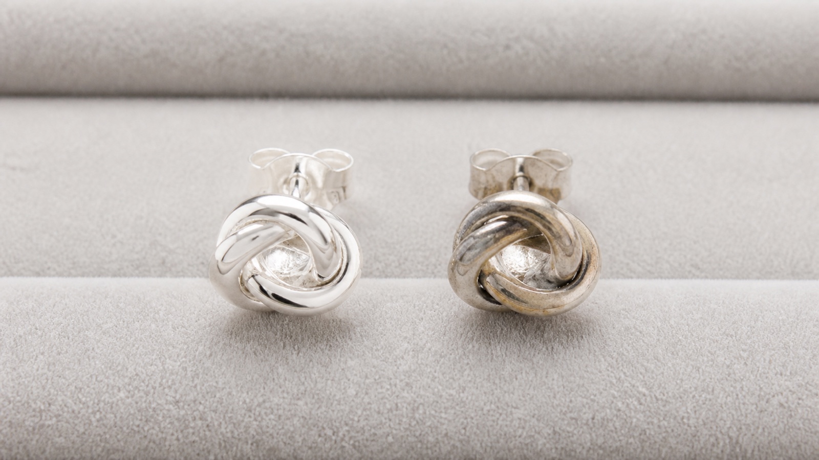 Matching sterling silver stud earrings shown clean and lightly tarnished side by side